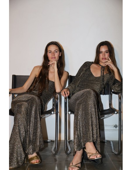 Pantalon de fête long et évasé avec des paillettes dorées