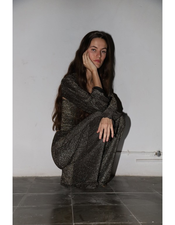 Pantalon de fête long et évasé avec des paillettes dorées