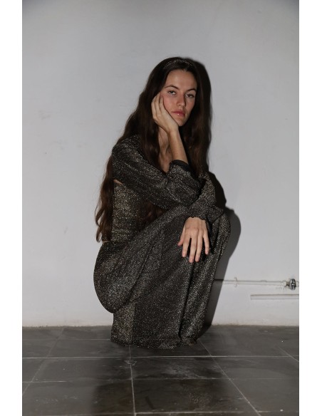 Flared long party trousers with golden glitter