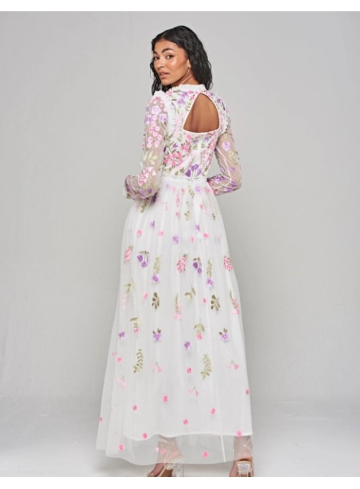 Long white dress in tulle embroidered with flowers