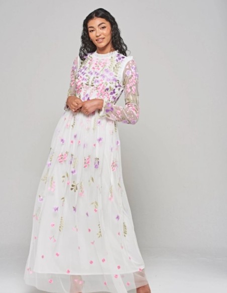 Long white dress in tulle embroidered with flowers