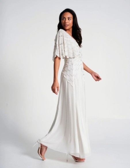 White wedding dress with raised sleeves and sequins