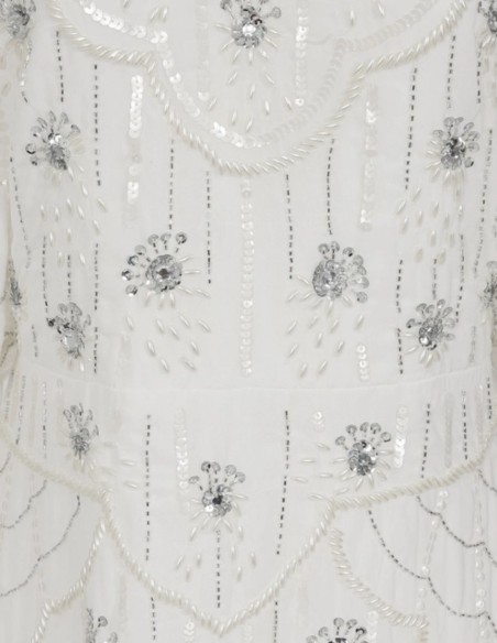 Robe de mariée blanche avec manches relevées et sequins