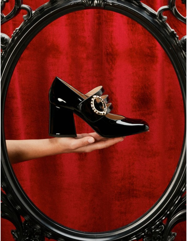 Black patent leather pumps with gold buckle fastening 2