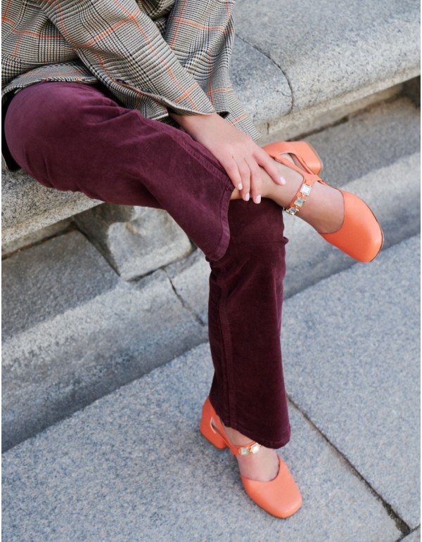 Coral pumps with stone buckle embellishment