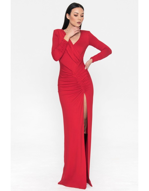 Long red party dress with long sleeves and a slit in the...