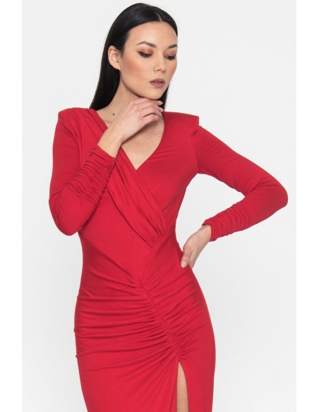 Long red party dress with long sleeves and a slit in the skirt