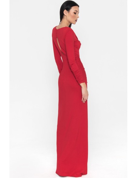 Long red party dress with long sleeves and a slit in the skirt
