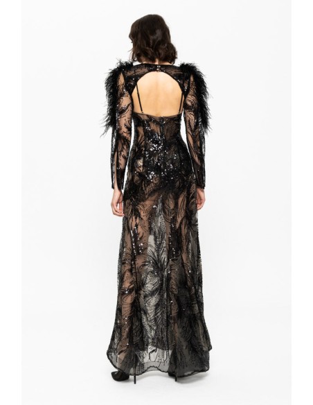 Long evening dress with sequin embroidery and feather details on the shoulders.