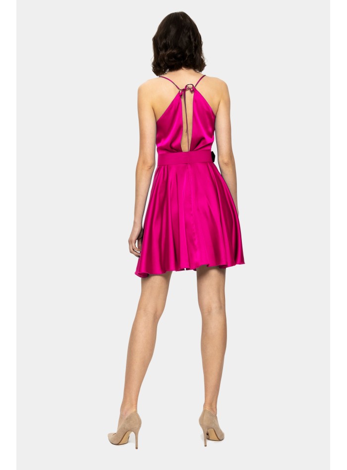 Short fuchsia satin guest dress with straps