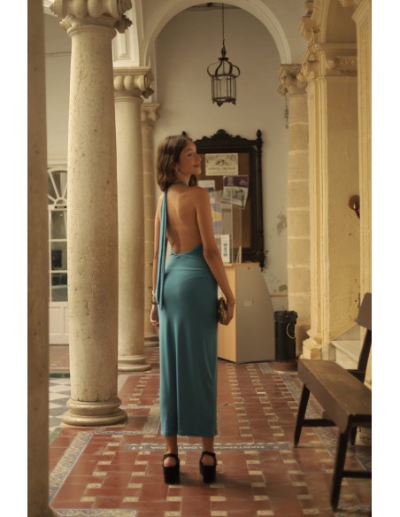 Robe longue de fête avec encolure dos nu et fente sur le côté