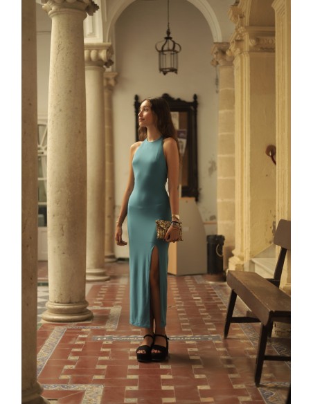 Robe longue de fête avec encolure dos nu et fente sur le côté