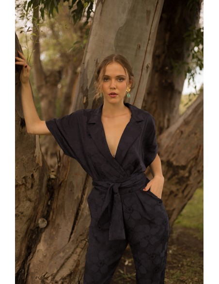 Party jumpsuit with cut at the waist and straight pants