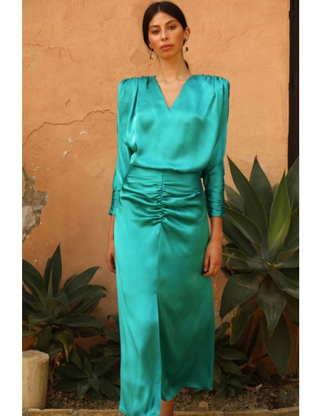 Party outfit with gathered waist and V-neckline