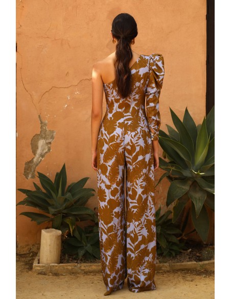 Party jumpsuit with asymmetrical neckline and floral print