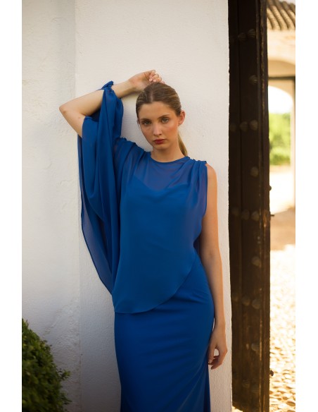 Long party dress with straps and matching cape detail