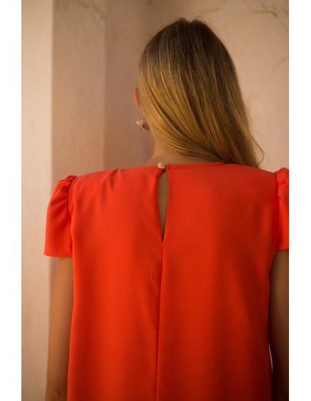 Conjunto de dos piezas con blusón cruzado y pantalón de pata ancha