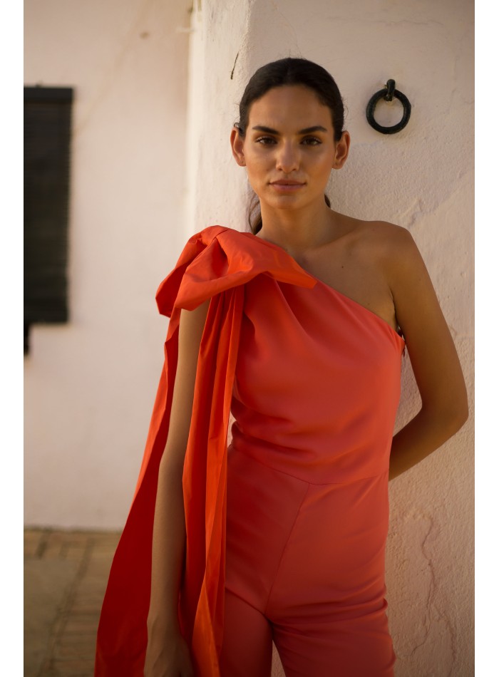 Long party jumpsuit with asymmetrical neckline...