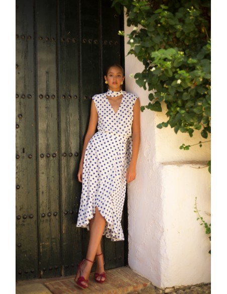 Conjunto top y falda cruzada con volante de lunares