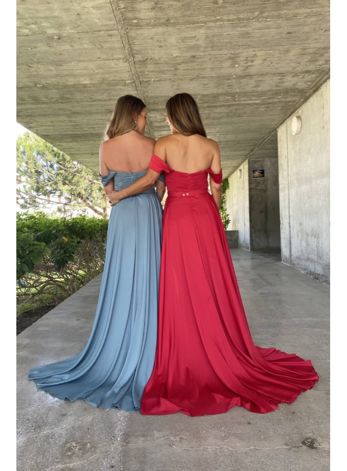 Caped ball gown with bardot neckline and draped...