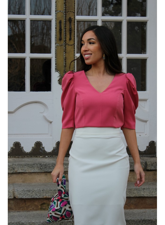 Coral party top with puffed sleeves and V-neckline