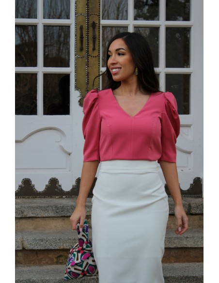 Top de fête corail avec manches bouffantes et décolleté en V
