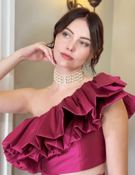 Conjunto top asimétrico con volante y pantalón largo recto