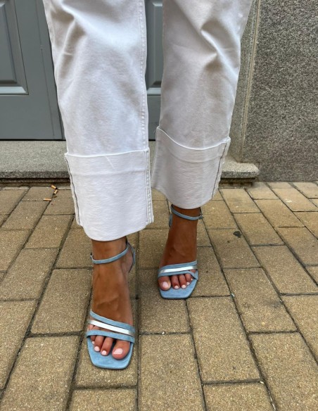 Blue party sandal with straps tied at the ankle
