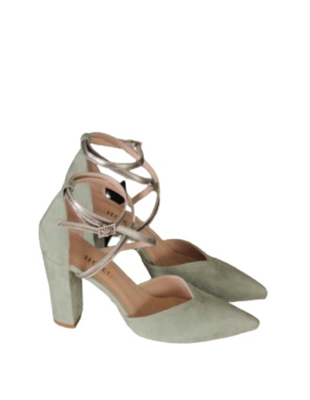 Green velvet party shoes with silver details.