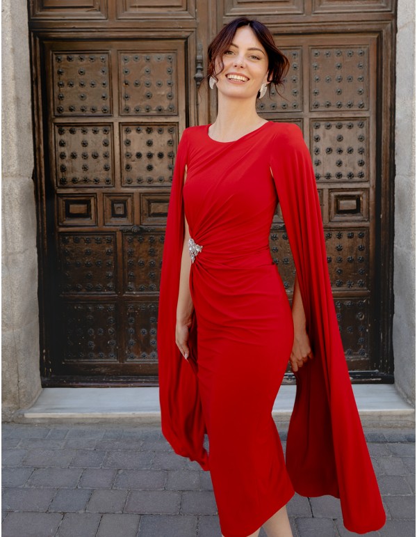 Midi party dress with long sleeve cape and draped at the...