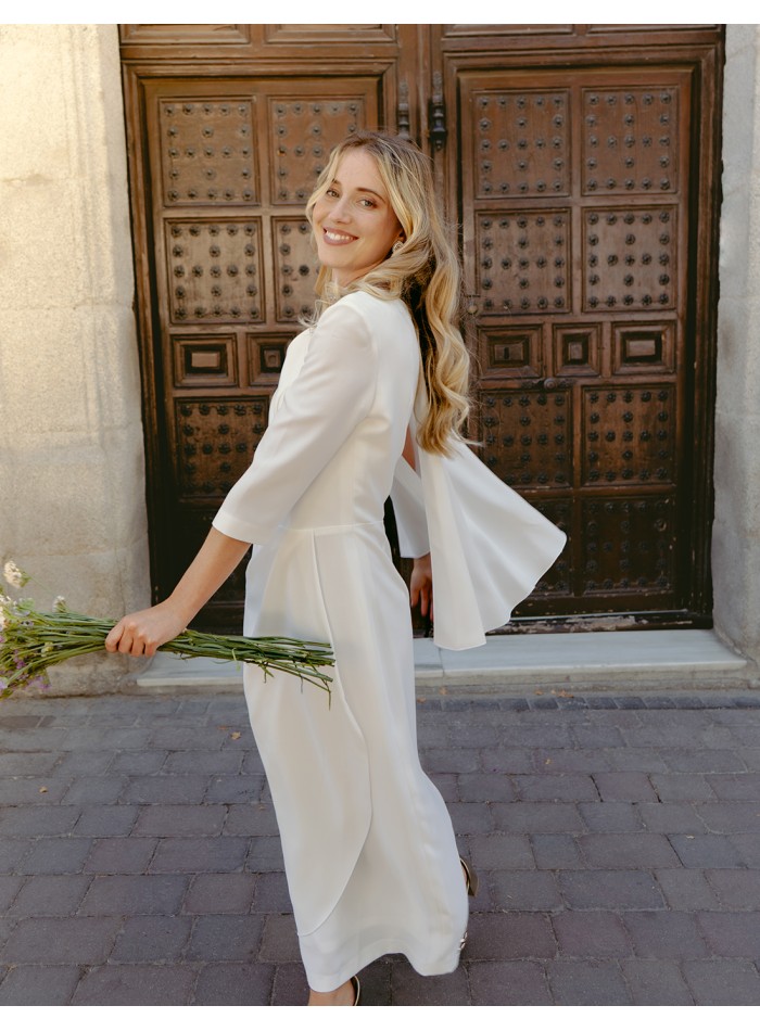 Cocktail dress with asymmetric french sleeves...