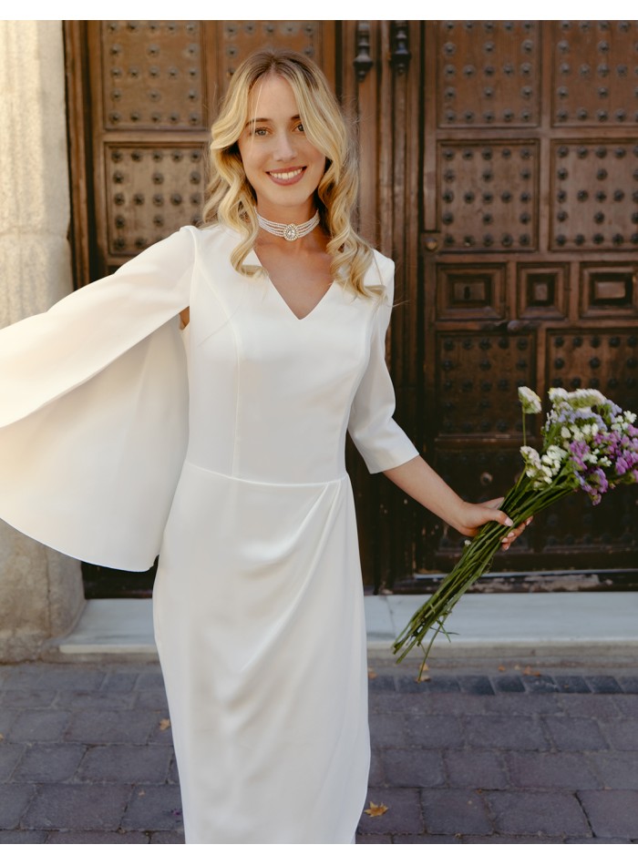 Vestido de cóctel con manga francesa asimétrica...