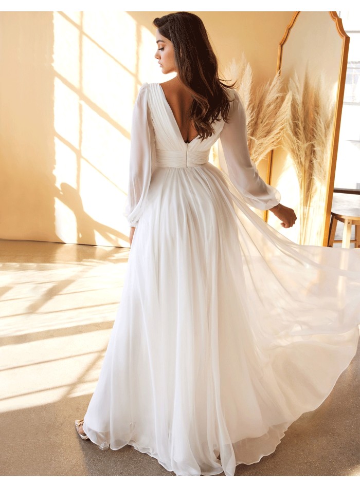 Chiffon wedding dress with long sleeves and...