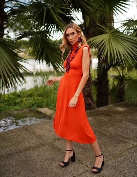 Orange midi party dress with high neck and shoulder pads