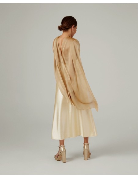 Long cape in gold cationic chiffon with double thread