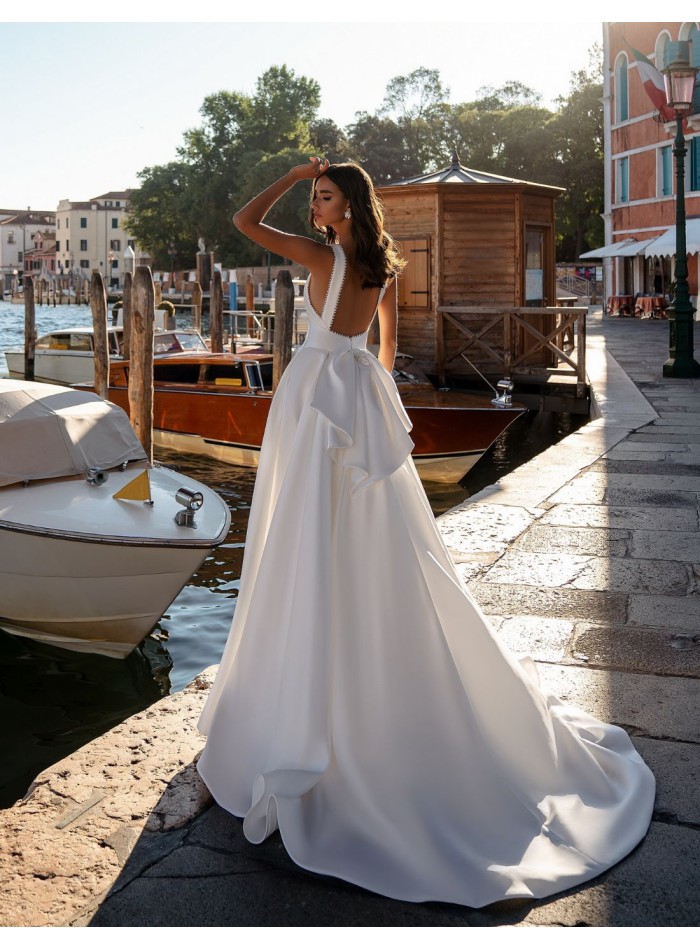 Satin wedding dress with a scoop neckline and...