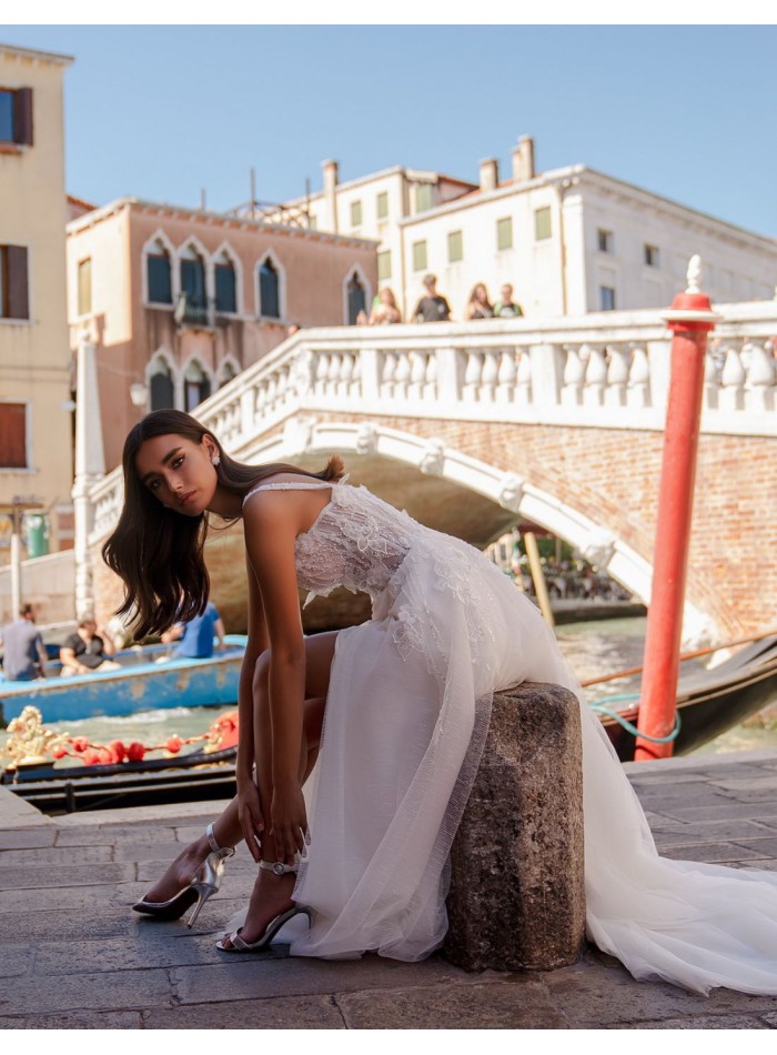 Ivory wedding dress with straps and floral...
