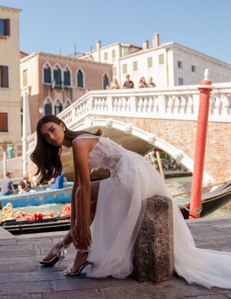 Ivory wedding dress with straps and floral embroidered lace bodice