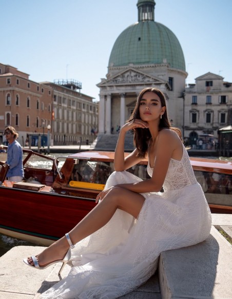 Ivory wedding dress with beaded neckline and bodice