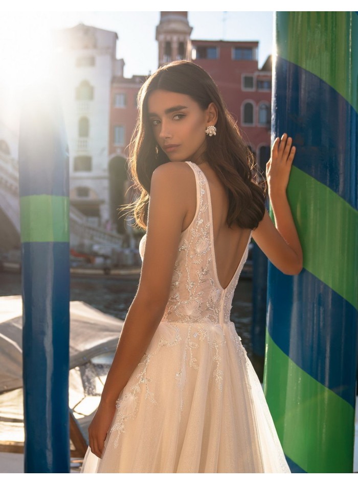 Ivory long wedding dress with V-neckline and...