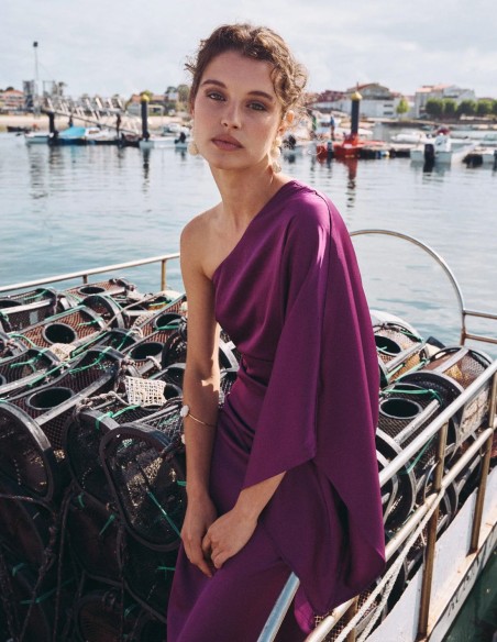 Long satin dress with bat sleeves and asymmetrical neckline