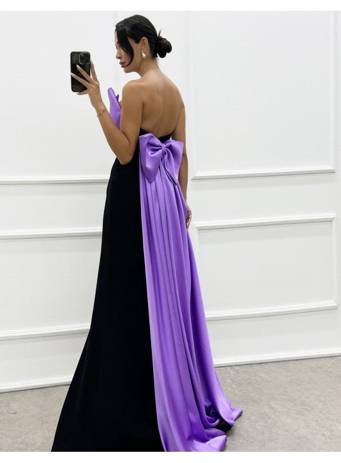Robe longue de fête avec encolure à nœud et traîne