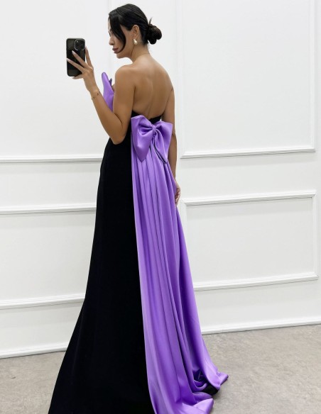 Robe longue de fête avec encolure à nœud et traîne