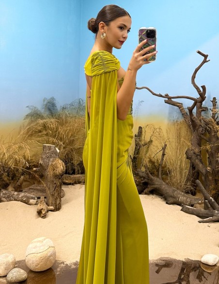 Evening dress with rhinestone neckline, draped detail and cape