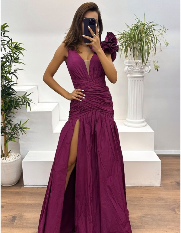 Maxi dress with asymmetrical ruffle and draped fabric