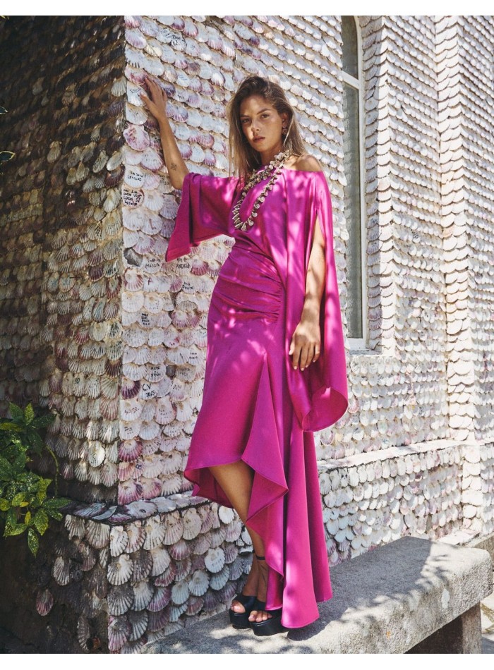 Asymmetric party dress with bat sleeves