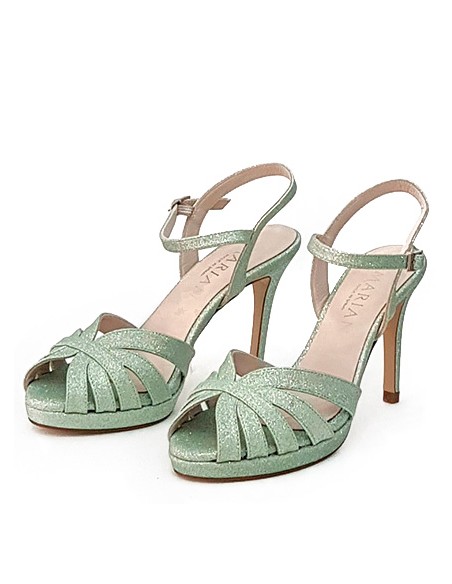 Platform party sandal with glitter and bracelet fastening
